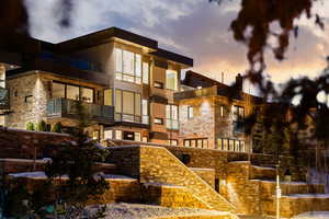 View of apartment building / complex featuring stairs