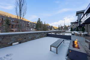 View of patio / terrace featuring a residential view and a fire pit