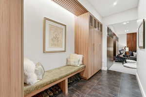 Mudroom featuring recessed lighting and baseboards