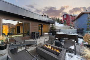 View of patio / terrace featuring a hot tub