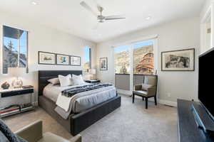 Bedroom with carpet and a ceiling fan