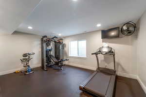 Exercise area featuring recessed lighting