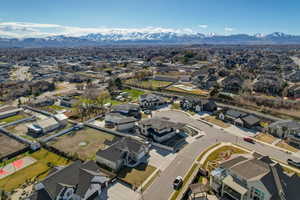Aerial view of residential area featuring a mountain backdrop