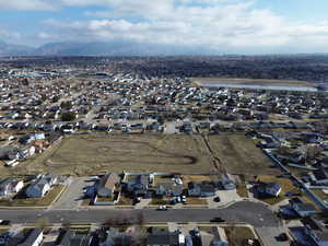 Aerial view of property's location featuring nearby suburban area