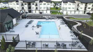 Community pool featuring a patio area