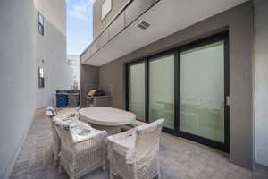View of patio featuring outdoor dining space