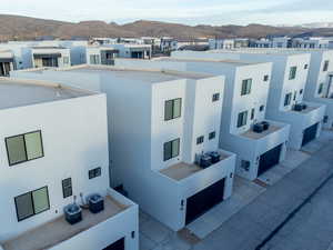View of building exterior featuring a residential view and a mountain view