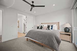 Bedroom with recessed lighting, light colored carpet, and ceiling fan