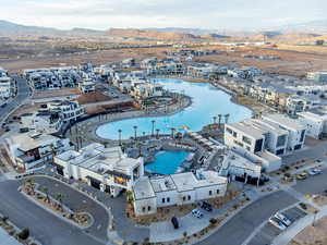 Aerial overview of property's location featuring a mountainous background