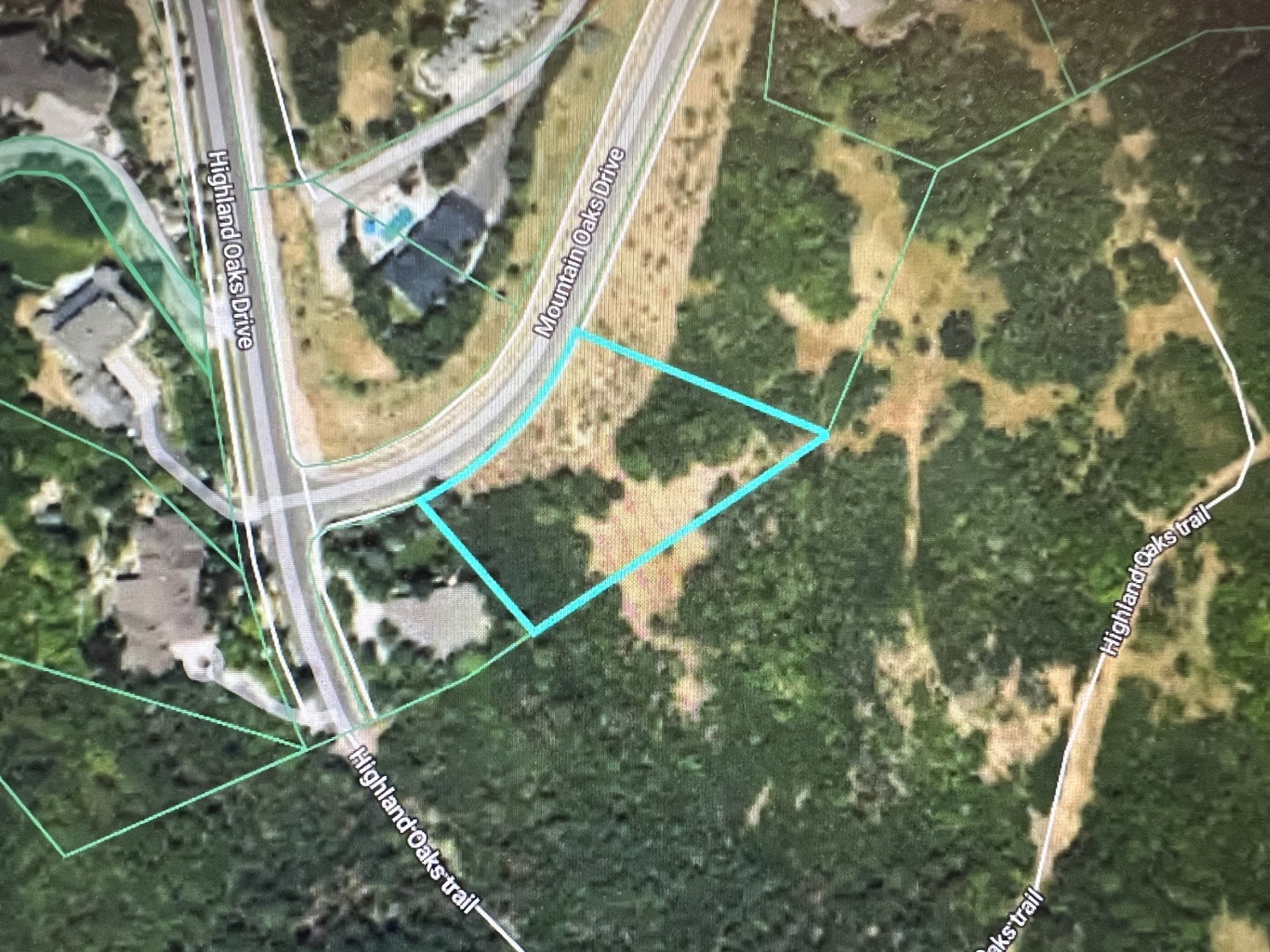 Aerial Map. Illustrating the property's boundaries and surrounding roads