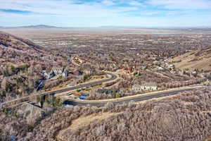 Aerial view of property's location with a mountain backdrop