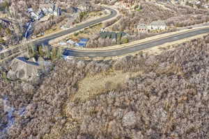 Aerial view of property's location featuring nearby suburban area