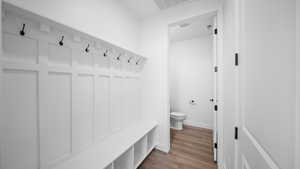Mudroom featuring wood finished floors