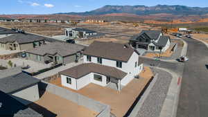 Aerial view of residential area with a mountainous background