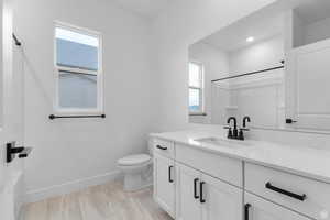 Bathroom with vanity and a shower
