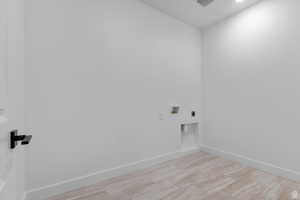 Laundry area with washer hookup and electric dryer hookup