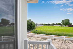 View of yard featuring an AC wall unit