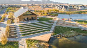 Aerial view of residential area featuring a water and mountain view