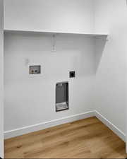 Laundry room with light wood finished floors, hookup for a washing machine, and electric dryer hookup