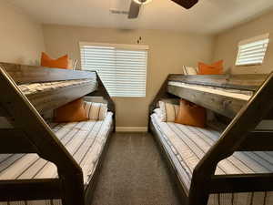 Bedroom with carpet and ceiling fan