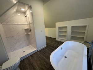 Separate tub and shower in master suite.