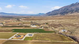 Overview of rural landscape with a mountain backdrop