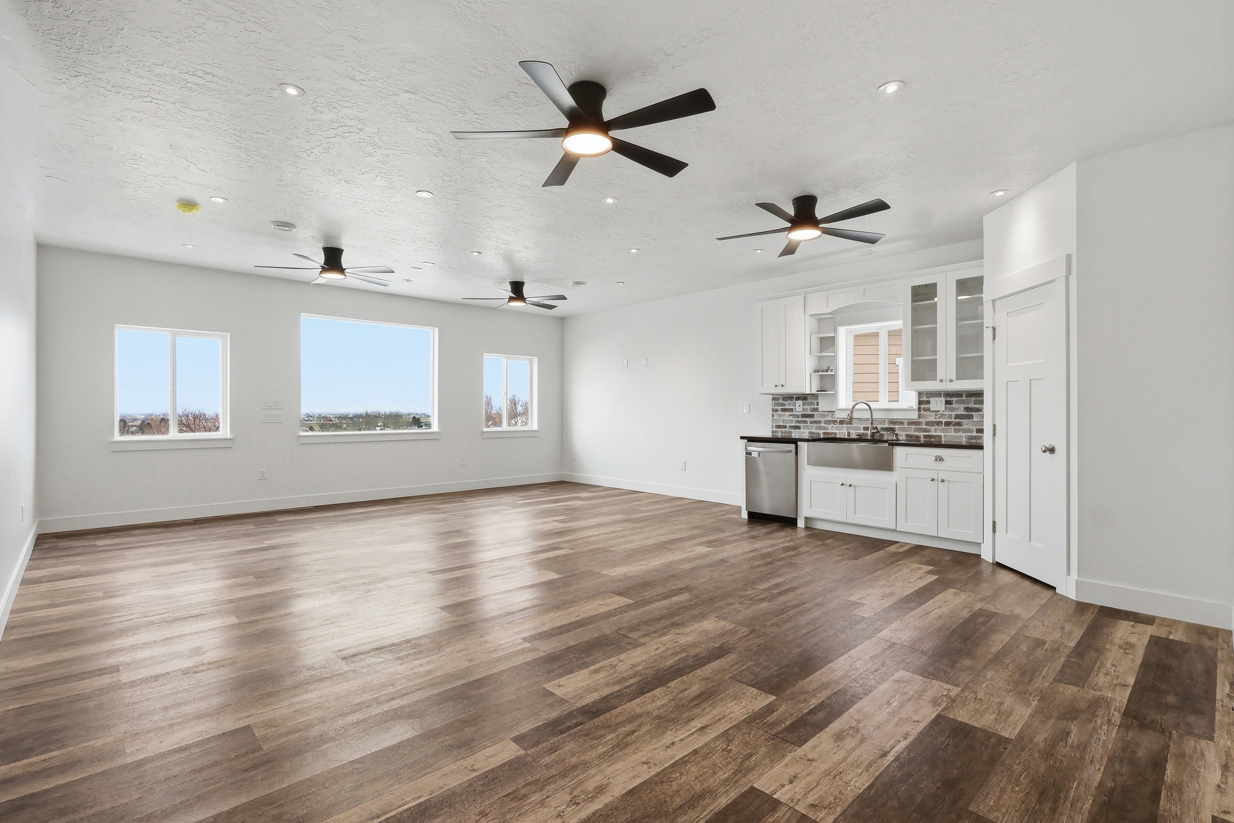 Family room perfect for entertainment room or game room with wet bar