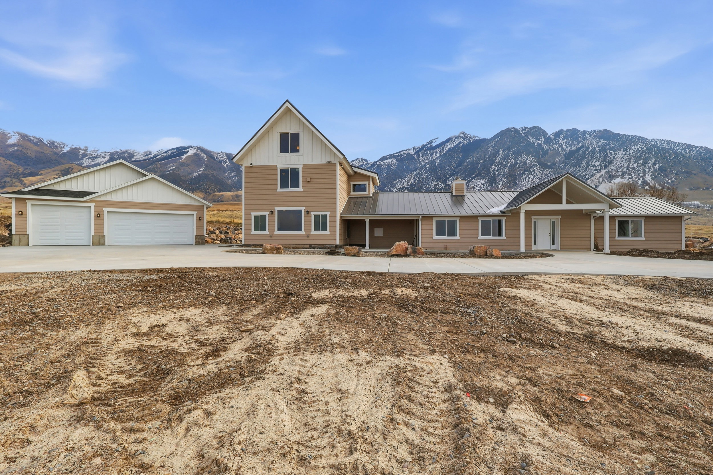 Front of home with three car garage