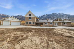 Front of home with three car garage