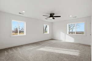 Master bedroom with large walk in closet and views of the mountains and valley