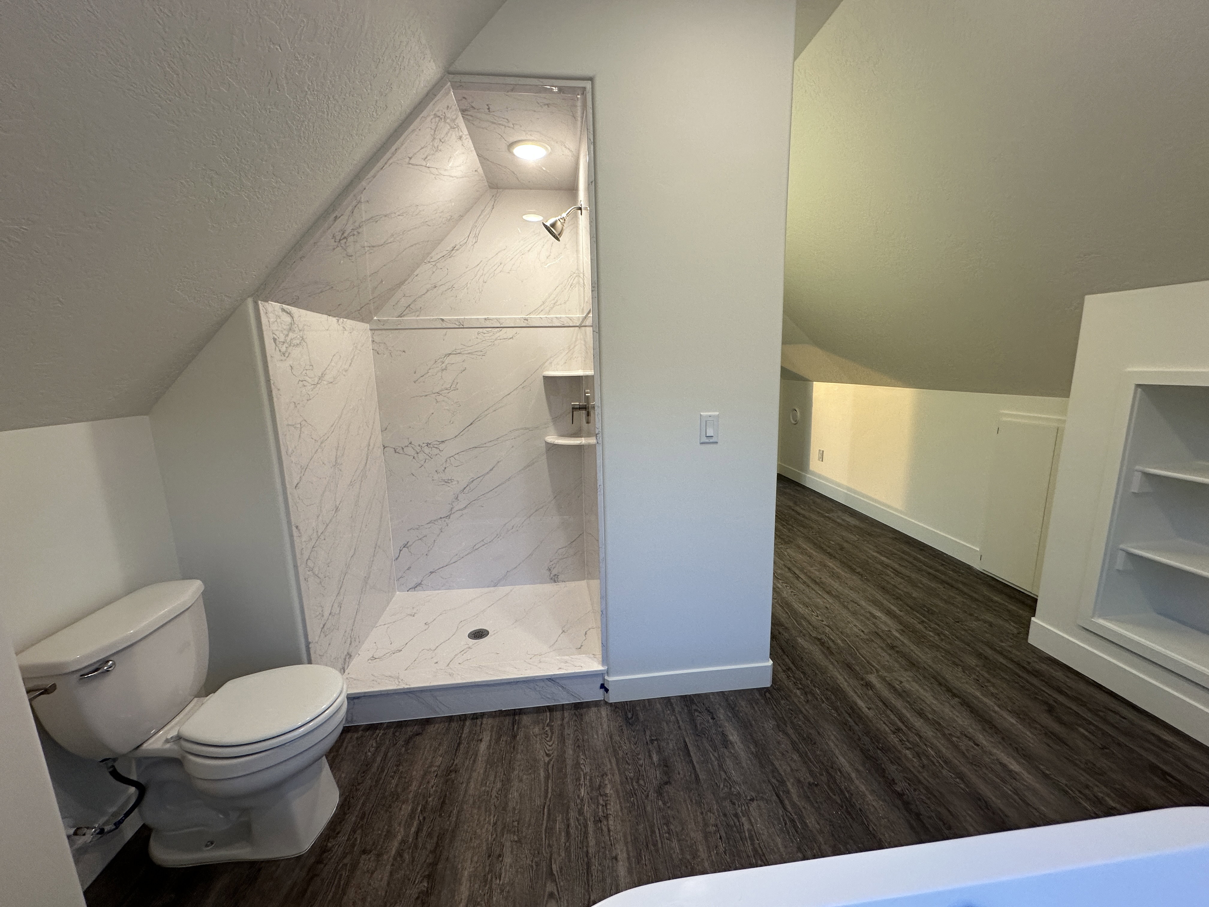 Master bath with shower and separate tub.