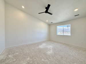 Unfurnished room featuring ceiling fan and recessed lighting