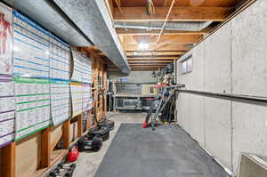 Workout area featuring concrete floors