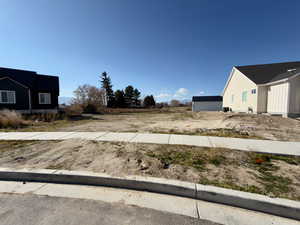 Lot with both neighboring houses