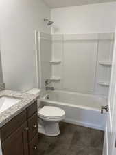 Full bath with shower / washtub combination and vanity