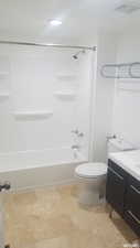 Full bath with vanity and bathing tub / shower combination