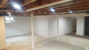 Basement featuring stairs