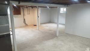 Below grade area featuring heating unit