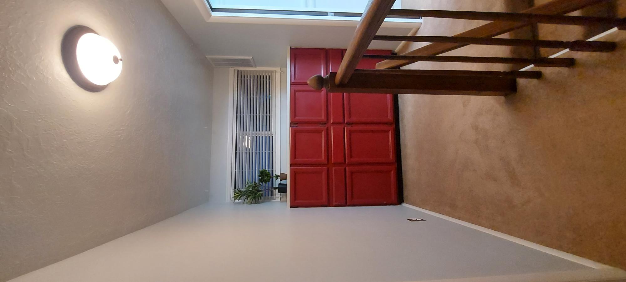 Landing area on second floor with built in storage.