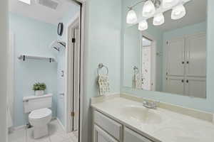 Bathroom with built in storage and huge garden tub.