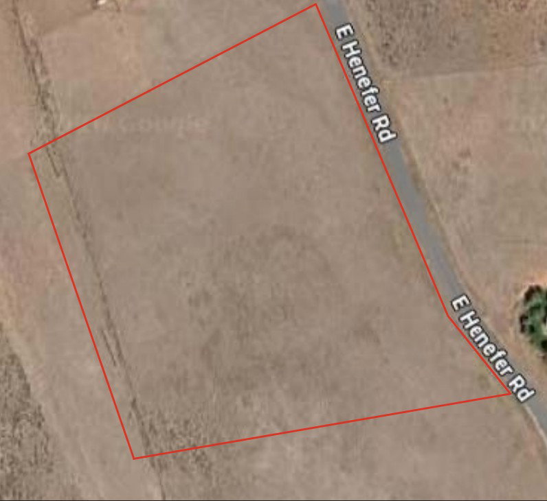 Aerial overview of property's location with property boundaries highlighted