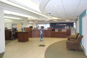 Reception featuring a paneled ceiling