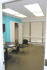 Office featuring a paneled ceiling