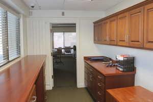Office space with dark carpet
