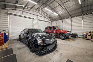 Garage featuring metal wall