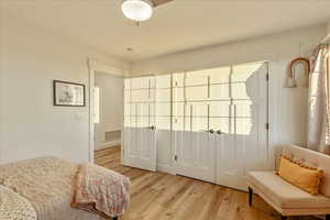 Bedroom with light wood finished floors
