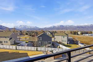 Mountain view featuring nearby suburban area