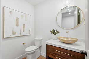 Bathroom featuring vanity and light wood-type flooring