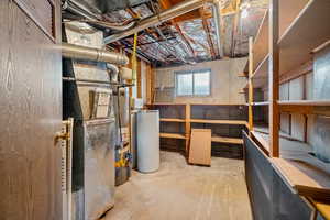 Basement with heating unit, a water softener system, and gas water heater