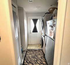 Laundry to back steps. Room for another fridge or freezer.